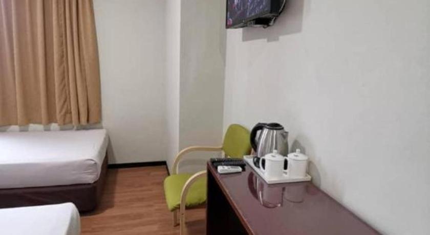 Hotel Holiday Кота-Кинабалу Экстерьер фото